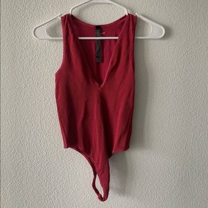 WOMENS OUT FROM UNDER RIBBED BODY SUIT.